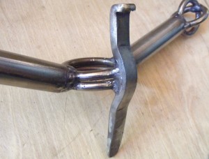 Offset Tang for attaching to sword with hose clamp and strapping tape